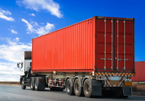 How are shipping containers transported by truck?